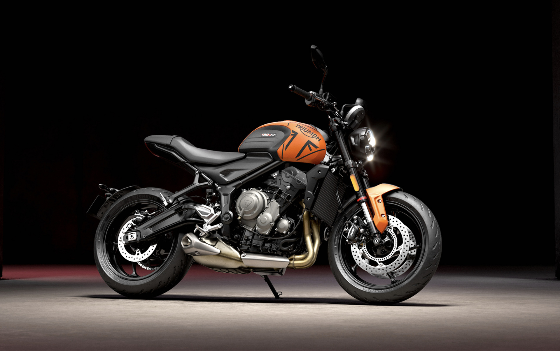 Triumph Header